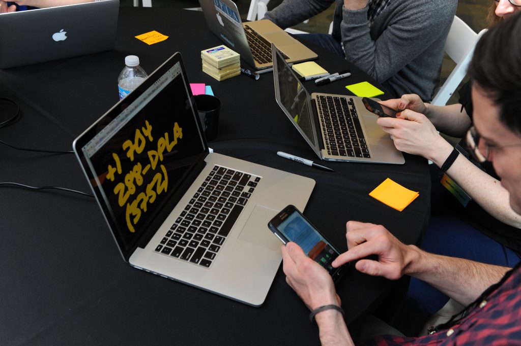 Working with Mark Matienzo’s Dial-a-DPLA app during the DPLAfest hackathon.